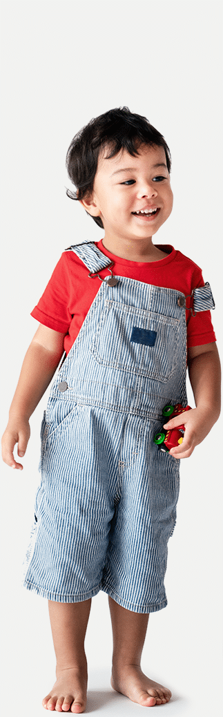 preschool boy in overalls