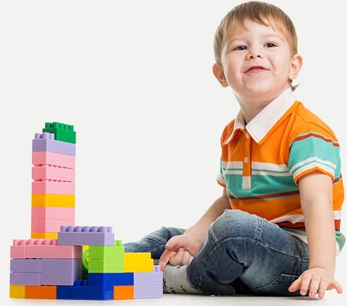 prekindergarten programs boy with blocks