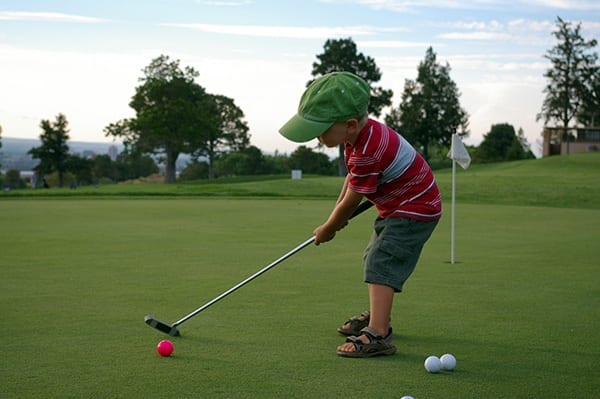preschool physical activity boy golfing